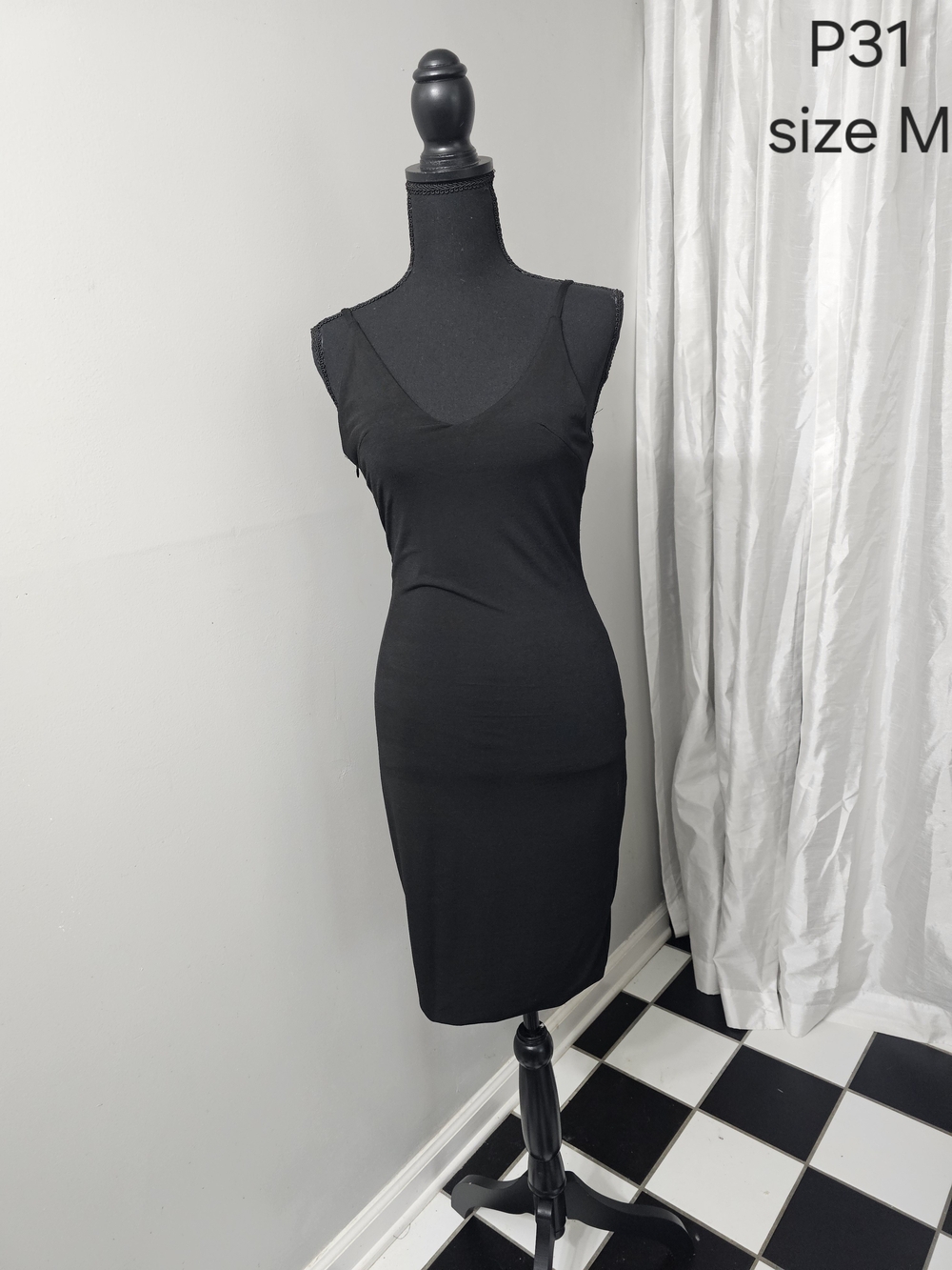 Classic Black Sleeveless Sheath Dress